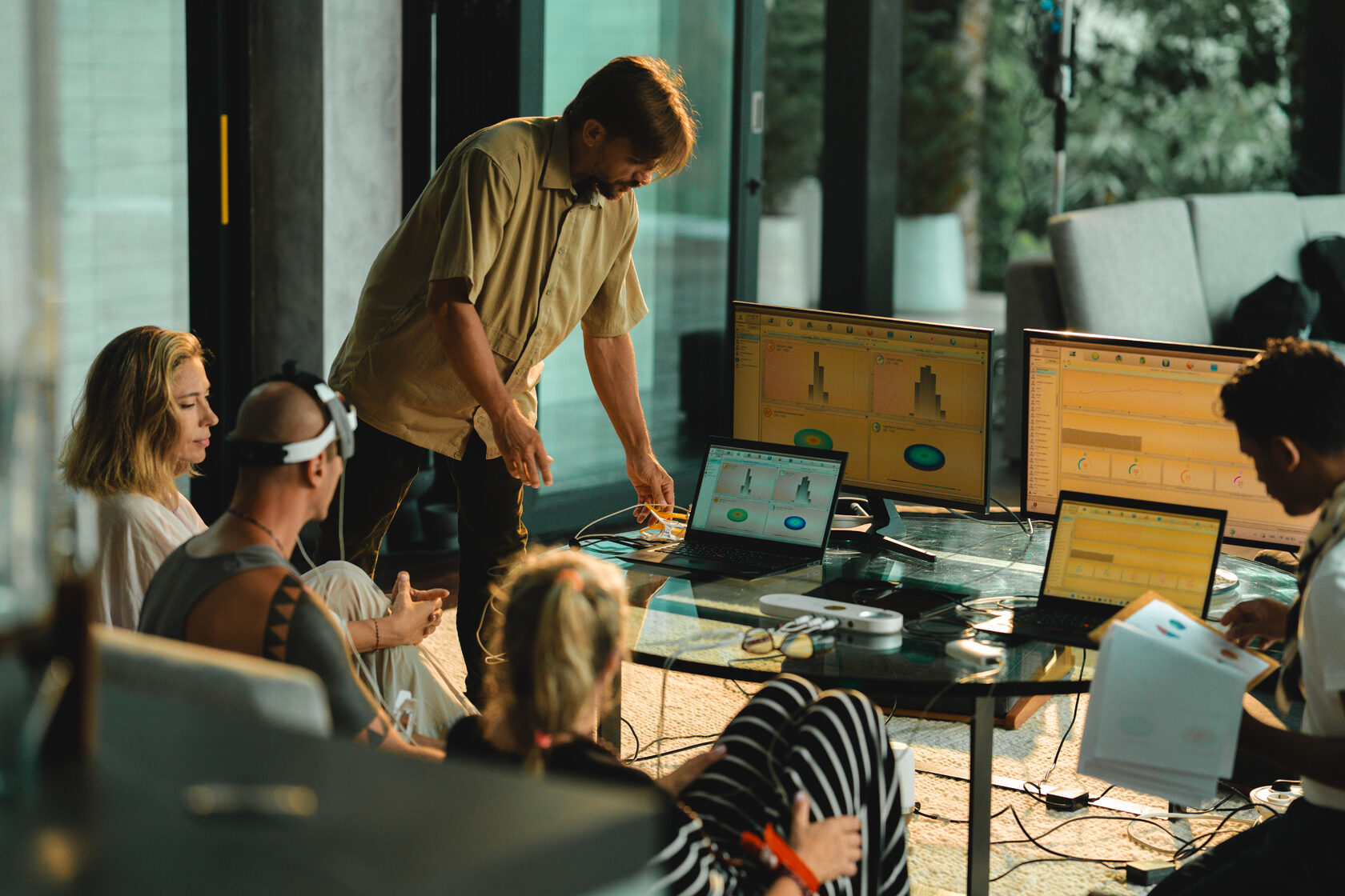 Workshop session with participants and monitoring equipment